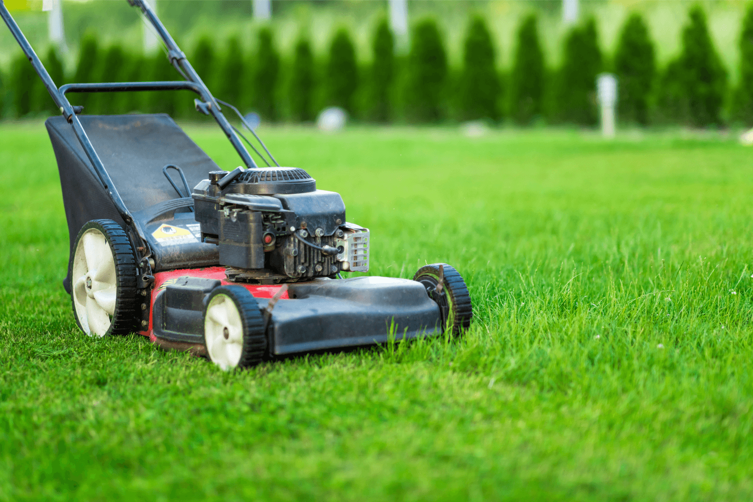 Lawn mower cutting grass – professional grass cutting service in Birmingham