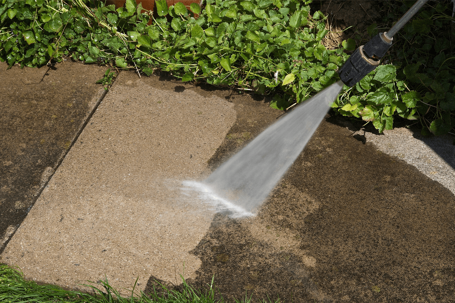 Pressure washer cleaning patio – professional pressure washing service in Birmingham